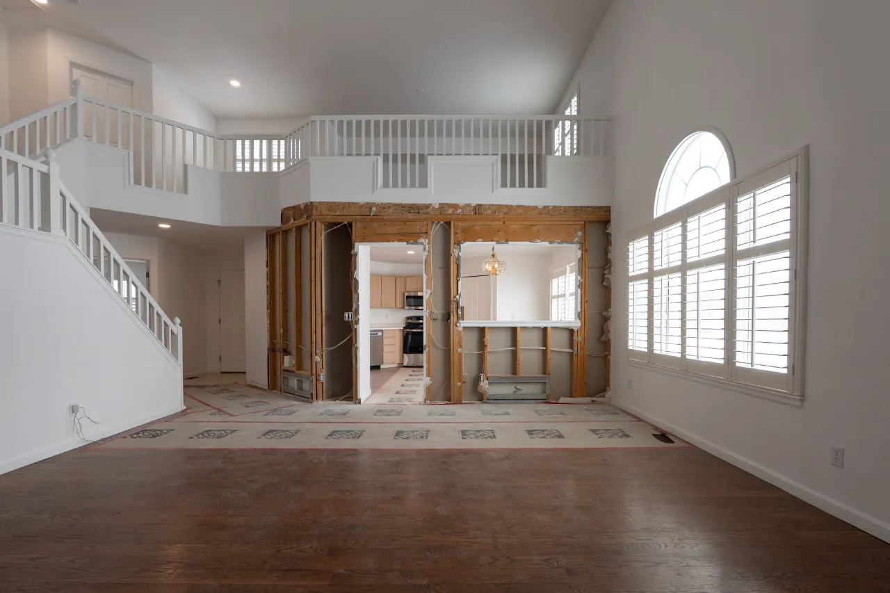 Great room mid-remodel in Arvada with the load-bearing wall opened to the studs
