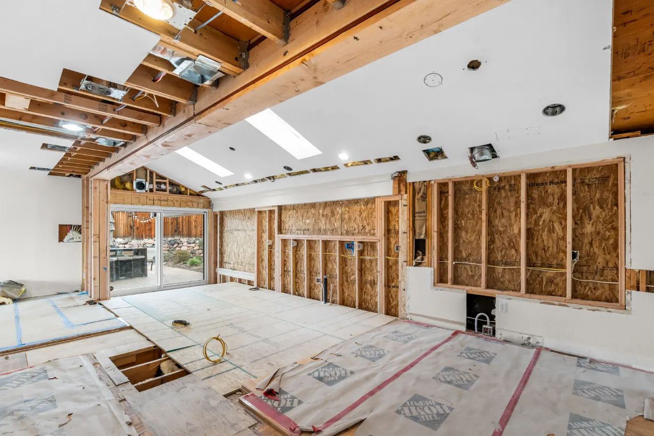 During: the window wall reframed and sheathed for the long sink window, Centennial kitchen remodel